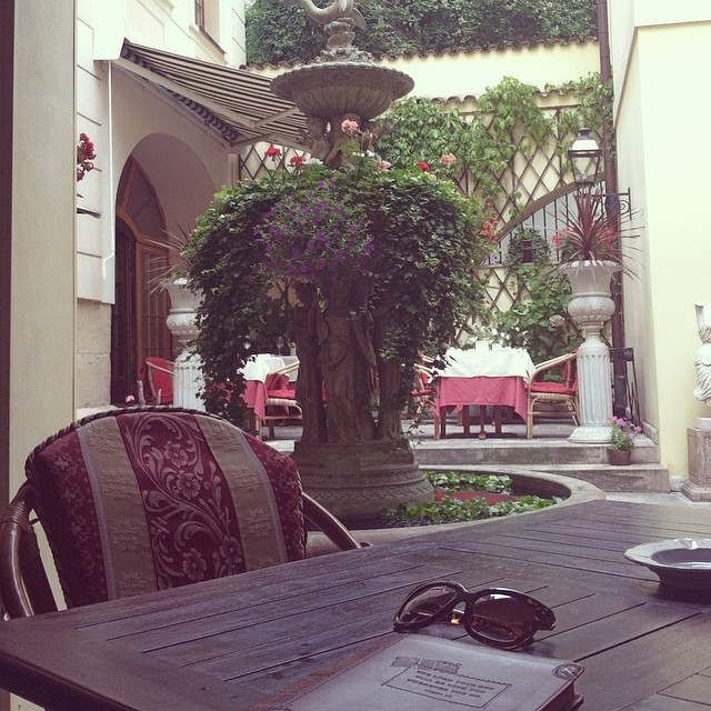 Getting in a little journaling in this gorgeous courtyard! #journal #break #Prague